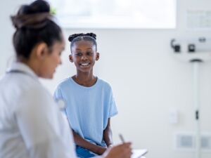 Child speaking with doctor