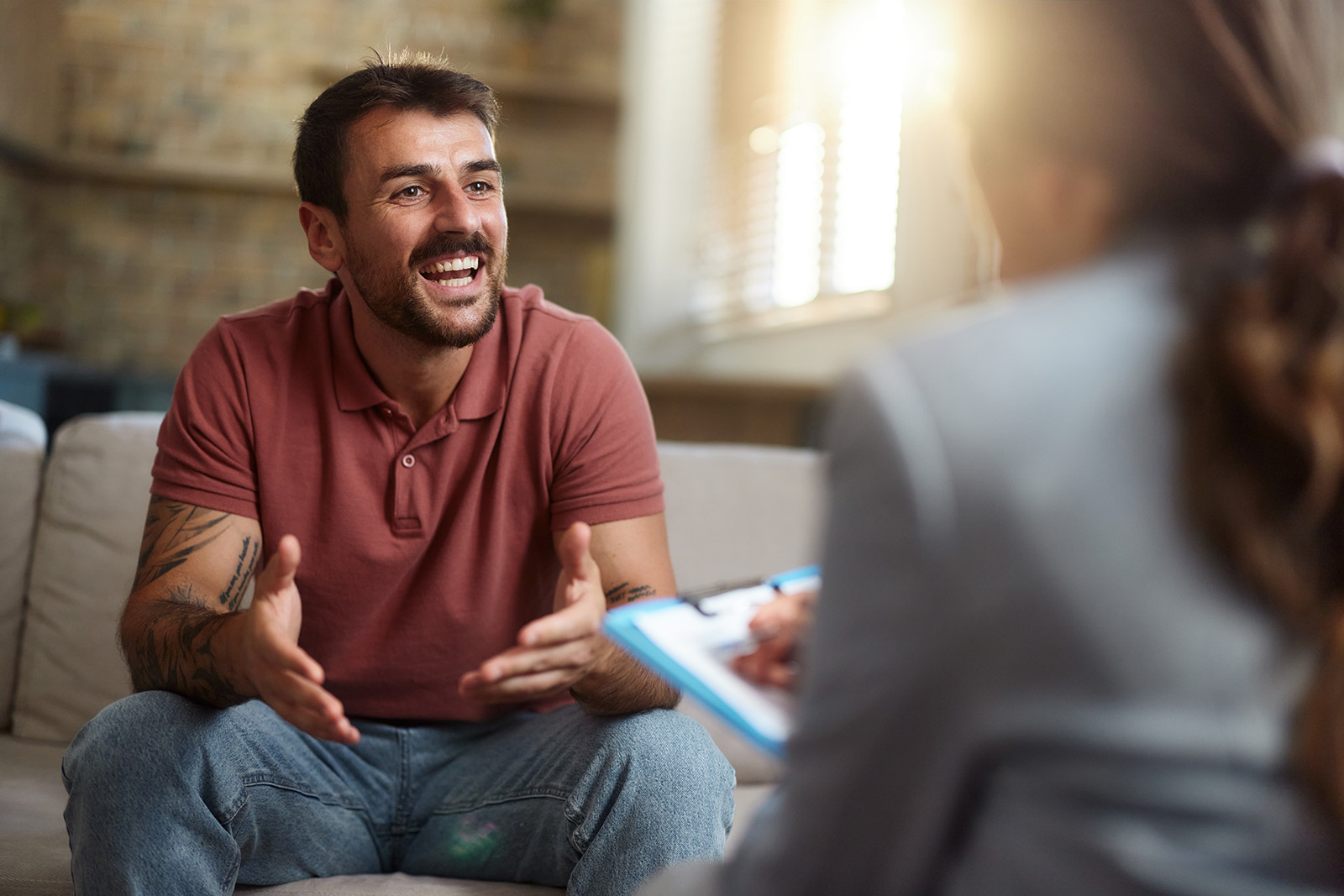Man in discussion with women reviewer