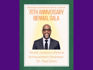 Portrait of Paul Elam on a flyer for the 70th anniversary biennial gala for the Michigan Center for Youth Justice.